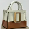Boyy Bobby 23 top handle tote ivory cream and tan brown colorblock leather with oversized gold buckle Nigeria