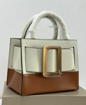 Boyy Bobby 23 top handle tote ivory cream and tan brown colorblock leather with oversized gold buckle Nigeria