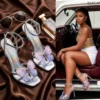 Silver holographic strappy stiletto heel with 3D purple butterfly crystal decoration and ankle strap Nigeria