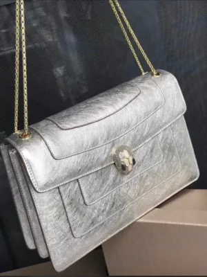 Bvlgari Serpenti Forever silver metallic karung leather chain flap bag with iconic snakehead clasp Nigeria