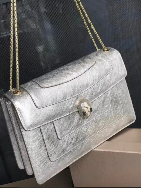 Bvlgari Serpenti Forever silver metallic karung leather chain flap bag with iconic snakehead clasp Nigeria