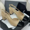 Chanel cap-toe slingback block heel beige and black leather with crystal CC logo Nigeria