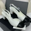 Chanel cap-toe slingback block heel white and black leather with crystal CC logo Nigeria