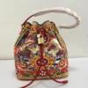 dolce-gabbana-carretto-siciliano-bucket-bag-red-multicolor-print-gold-padlock-nigeria bucket-bag-red-multicolor-print-gold-padlock-nigeria.webpDolce and Gabbana Carretto Siciliano print bucket bag red multicolor with gold DG padlock and red drawstring Nigeria