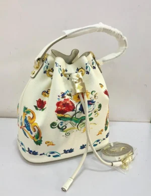 Dolce and Gabbana Maiolica floral baroque print bucket bag white leather trim gold padlock drawstring top handle Nigeria