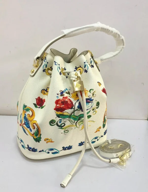 dolce-gabbana-maiolica-bucket-bag-white-floral-baroque-print-gold-padlock-nigeria Dolce and Gabbana Maiolica floral baroque print bucket bag white leather trim gold padlock drawstring top handle Nigeria