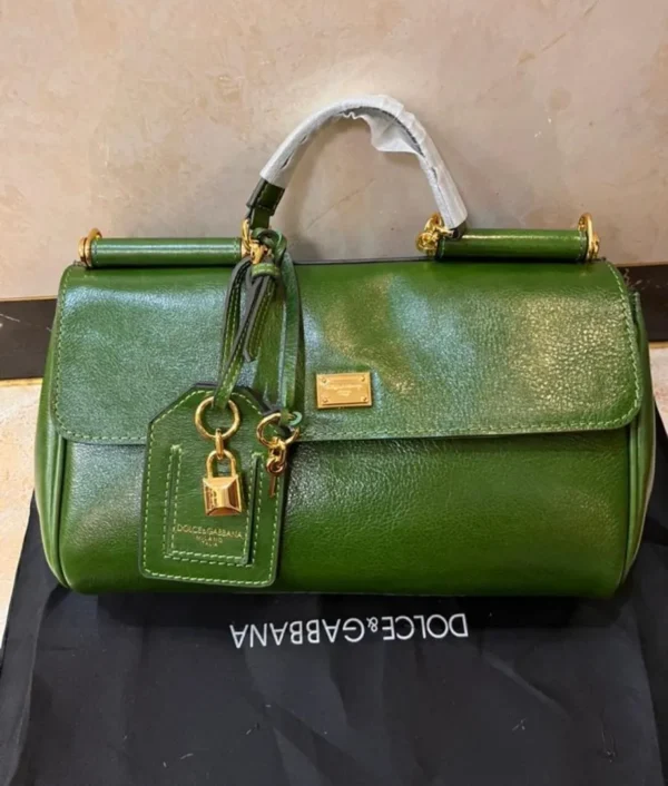 dolce-gabbana-sicily-east-west-top-handle-bag-emerald-green-gold-lock-charm-nigeria Dolce Gabbana Sicily East West top handle bag emerald green leather with gold DG plate lock charm and dustbag Nigeria