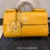 dolce-gabbana-sicily-east-west-top-handle-bag-mustard-yellow-gold-lock-charm-nigeria Dolce Gabbana Sicily East West top handle bag mustard yellow leather with gold DG plate lock charm and dustbag Nigeria
