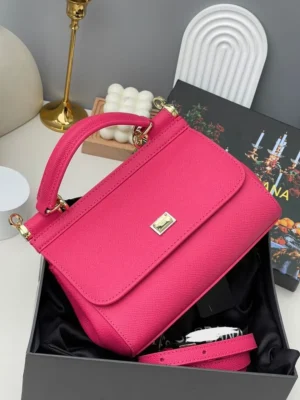 dolce-gabbana-sicily-top-handle-bag-hot-pink-fuchsia-leather-gold-hardware-nigeria Dolce Gabbana Sicily top handle bag hot pink fuchsia leather with gold DG plate hardware in branded box Nigeria