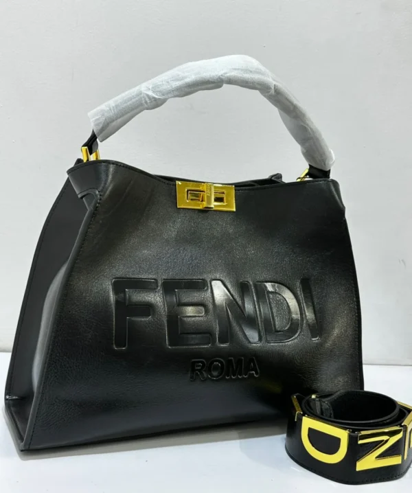 fendi-peekaboo-iseeu-large-black-leather-gold-twist-lock-nigeria Fendi Peekaboo ISeeU large black leather bag with embossed FENDI ROMA logo and gold twist-lock Nigeria