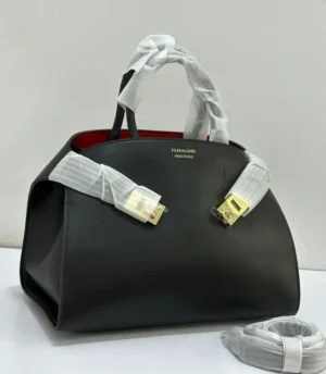 ferragamo-trifolio-tote-bag-black-smooth-leather-gold-clasp-red-interior-nigeria Ferragamo Trifolio tote bag black smooth leather with gold clasp hardware red interior and detachable strap Nigeria