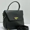 gilda-ferretti-bee-clasp-top-handle-bag-black-pebbled-leather-gold-stud-nigeria Gilda Ferretti black pebbled leather top handle bag with gold bee clasp and stud detailing Nigeria