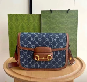 Gucci Horsebit 1955 shoulder bag GG denim canvas with cognac leather trim Nigeria