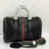 gucci-web-stripe-black-boston-top-handle-bag-pamzy-wear.webp Gucci web stripe black Boston top handle bag red green stripe gold zipper – Pamzy Wears Lagos
