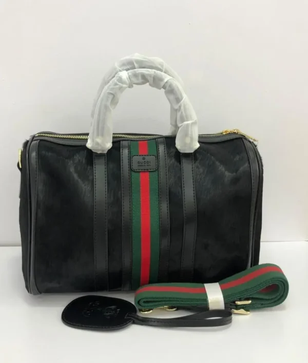 gucci-web-stripe-black-boston-top-handle-bag-pamzy-wear.webp Gucci web stripe black Boston top handle bag red green stripe gold zipper – Pamzy Wears Lagos