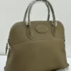 hermes-bolide-style-tote-bag-taupe-etoupe-pebbled-leather-silver-hardware-nigeria Hermes Bolide style tote bag taupe etoupe pebbled leather with oval medallion detail silver hardware and shoulder strap Nigeria