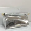 jacquemus-le-bambino-long-silver-mirror-metallic-gold-hardware-nigeria Jacquemus Le Chiquito silver mirror metallic clutch bag with silver logo and chain strap Nigeria