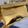 jacquemus-le-chiquito-gold-mirror-metallic-clutch-bag-chain-strap-nigeria Jacquemus Le Chiquito gold mirror metallic clutch bag with silver logo and chain strap Nigeria