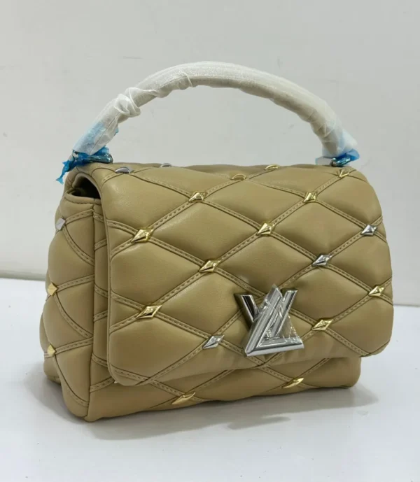 louis-vuitton-go-14-mm-beige-tan-quilted-lambskin-malletage-mixed-gold-silver-stud-hardware-nigeria Louis Vuitton GO-14 MM beige tan quilted lambskin Malletage with mixed gold silver diamond stud hardware and LV twist lock Nigeria