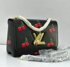 leather-cherry-print-nigeria.webpLouis Vuitton Twist MM black Epi leather with cherry print Nigeria