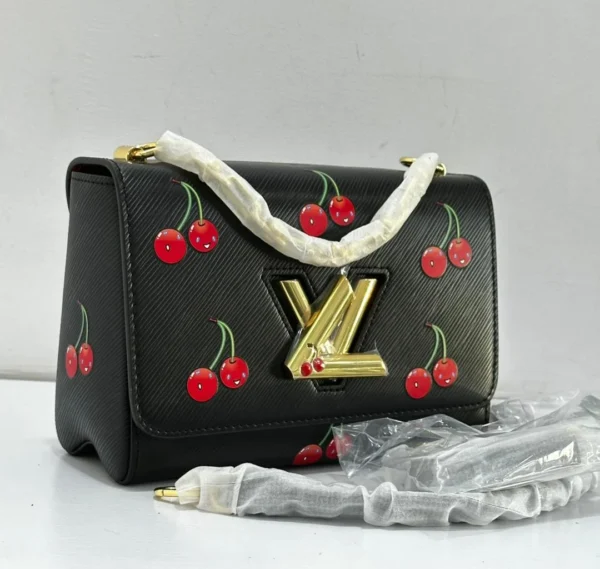 leather-cherry-print-nigeria.webpLouis Vuitton Twist MM black Epi leather with cherry print Nigeria