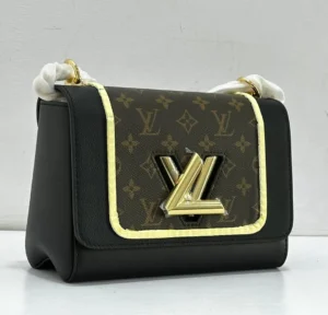 Louis Vuitton Twist MM monogram canvas with black leather and yellow trim Nigeria