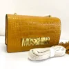 moschino-croc-embossed-flap-bag-mustard-caramel-gold-moschino-logo-chain-nigeria Moschino Croc-Embossed Flap Bag