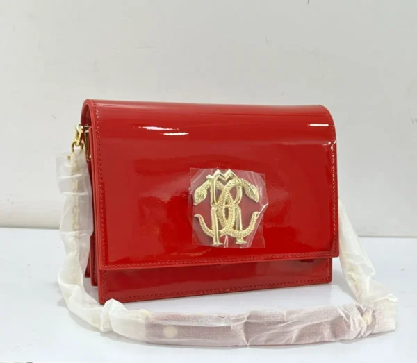 roberto-cavalli-patent-leather-shoulder-bag-red-gold-rc-logo-chain-nigeria roberto-cavalli-patent-leather-shoulder-bag-red-gold-rc-logo-chain-nigeria.