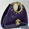 Roberto Cavalli Purple patent leather fan-shaped satchel with gold laurel wreath top handle RC logo and pyramid studs Nigeri