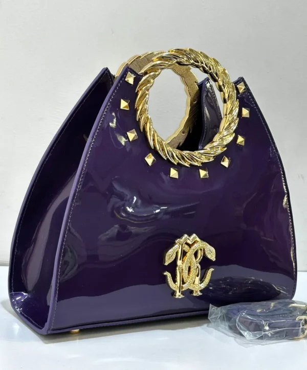 Roberto Cavalli Purple patent leather fan-shaped satchel with gold laurel wreath top handle RC logo and pyramid studs Nigeri