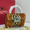 Roger Vivier orange python-print mini top handle bag with crystal buckle Nigeria