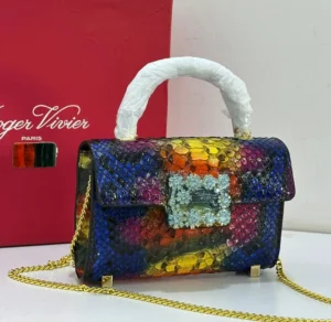 roger-vivier-multicolour-python-crystal-clutch-pamzy-wears Roger Vivier multicolour python print crystal clasp box clutch gold chain – Pamzy Wears Lagos