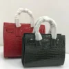 saint-laurent-sac-de-jour-top-handle-bag-red and black-croc-embossed-leather-nigeria tom-ford-top-handle-bag-brown-croc-embossed-leather-gold-tf-clasp-chain-strap-nigeria