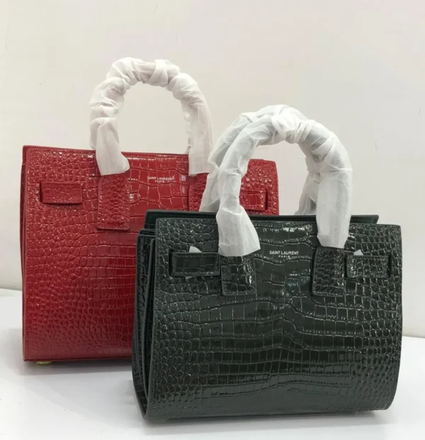 saint-laurent-sac-de-jour-top-handle-bag-red and black-croc-embossed-leather-nigeria tom-ford-top-handle-bag-brown-croc-embossed-leather-gold-tf-clasp-chain-strap-nigeria