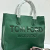 Tom Ford logo debossed leather tote bag in emerald green with detachable striped strap, made in Italy