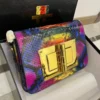 Tom Ford Natalia clutch crossbody multicolor python with large gold turn-lock Nigeria