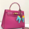 Hermes-fuchsia-pink-structured-leather-handbag-gold-turnlock