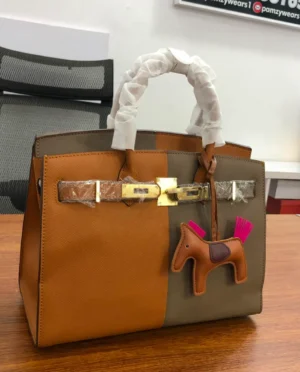 Hermes tan-olive-two-tone- brown structured-leather-tote-turnlock Hermes Tan and olive two-tone structured leather tote with gold turn-lock clasp