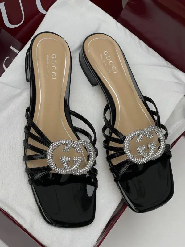 gucci-crystal-gg-low-heeled-black-sandals. Gucci black patent leather low-heeled sandals with crystal GG logo LAGOS NIGERIA